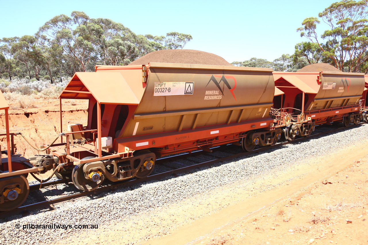 190129 4325
Binduli, on Mineral Resources Ltd loaded iron ore train service from Koolyanobbing to Esperance #3033 with MRL's MHPY type iron ore waggon MHPY 00327 built by CSR Yangtze Co China serial 2014/382-327 in 2014 as a batch of 382 units, these bottom discharge hopper waggons are operated in 'married' pairs.
Keywords: MHPY-type;MHPY00327;2014/382-327;CSR-Yangtze-Co-China;
