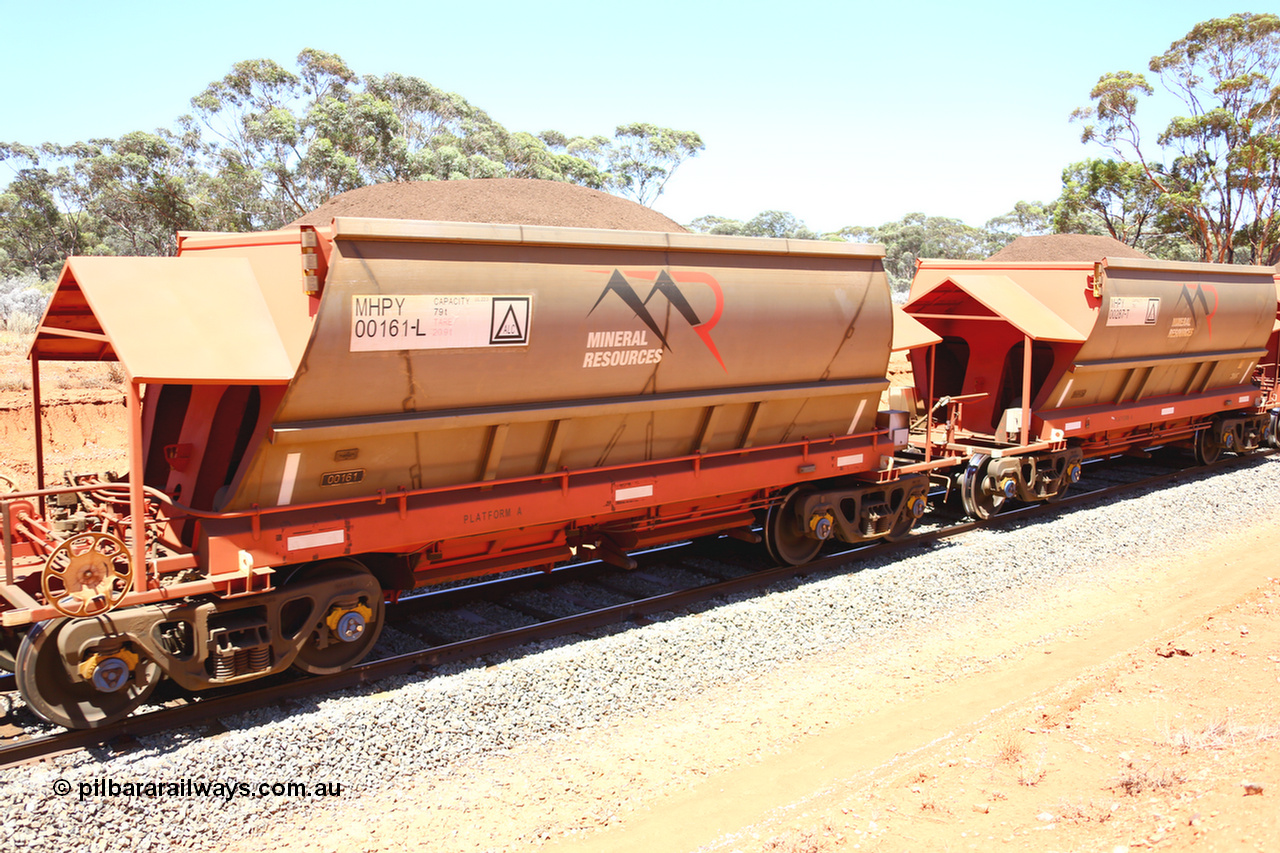 190129 4338
Binduli, on Mineral Resources Ltd loaded iron ore train service from Koolyanobbing to Esperance #3033 with MRL's MHPY type iron ore waggon MHPY 00161 built by CSR Yangtze Co China serial 2014/382-161 in 2014 as a batch of 382 units, these bottom discharge hopper waggons are operated in 'married' pairs.
Keywords: MHPY-type;MHPY00161;2014/382-161;CSR-Yangtze-Co-China;