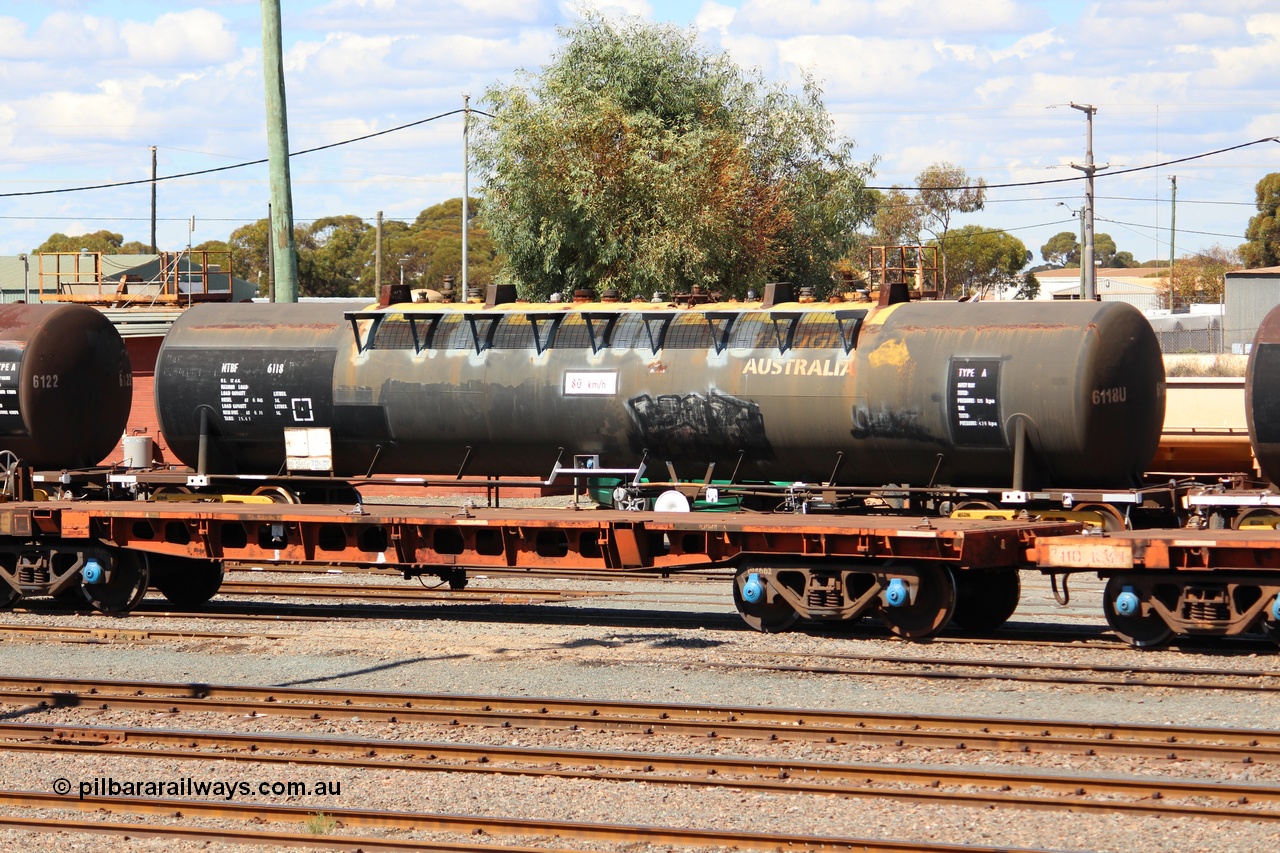 140406 IMG 1928
West Kalgoorlie, NTBF type fuel tank waggon NTBF 6118, with former owners name (Freight Australia) visible. Originally built by Comeng NSW in 1975 as an SCA type 69,000 litre bitumen tank waggon SCA 267 for Shell NSW. Peter Donaghy image.
Keywords: Peter-D-Image;NTBF-type;NTBF6118;Comeng-NSW;SCA-type;SCA267;
