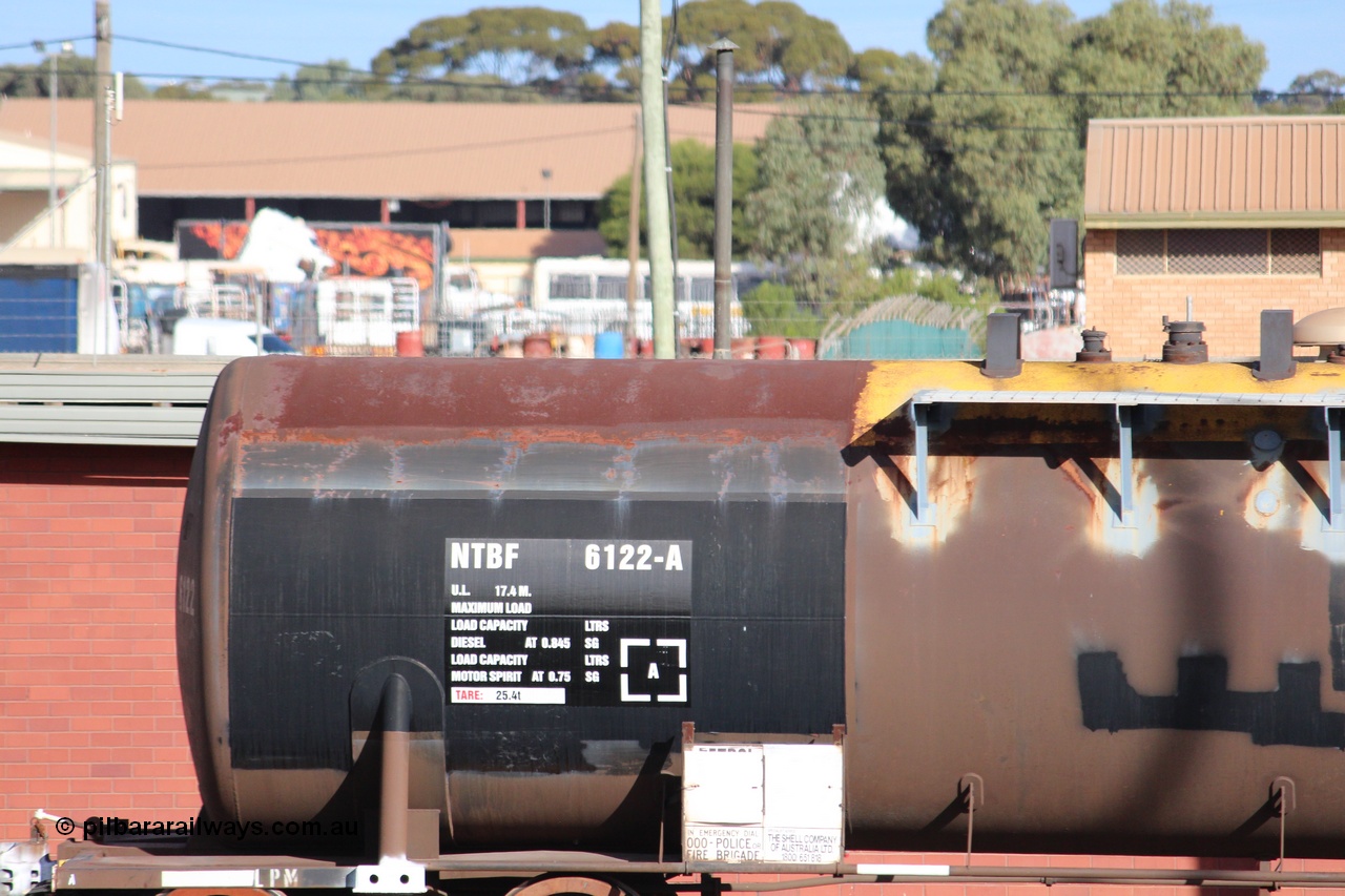 140409 IMG 1965
West Kalgoorlie, NTBF 6122 fuel tank waggon detail image, built by Comeng NSW 1975 as an SCA type bitumen tank waggon for Shell Bitumen NSW as SCA 273. Peter Donaghy image.
Keywords: Peter-D-Image;NTBF-type;NTBF6122;Comeng-NSW;SCA-type;SCA273;