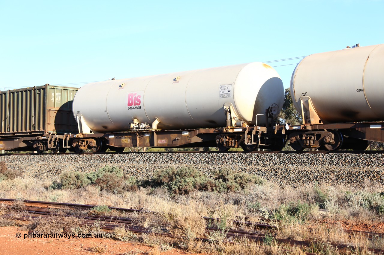 160523 2746
West Kalgoorlie, Malcolm freighter, train no. 1029, AZKY type anhydrous ammonia tank waggon AZKY 32239, one of twelve built by Goninan WA in 1998 as type WQK for Murrin Murrin traffic, fitted with Bis Industries anhydrous ammonia tank A6J.
Keywords: AZKY-type;AZKY32239;Goninan-WA;WQK-type;