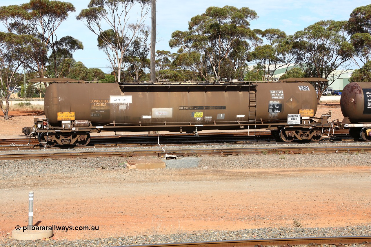 160523 3286
West Kalgoorlie, ATPF 580 fuel tank waggon built by WAGR Midland Workshops 1976 for Shell as type WJP, 80.66 kL one compartment one dome, capacity of 80500 litres, it also spent time in SA in 1985, fitted with type F InterLock couplers, Shell Fleet no. TR715 still visible.
Keywords: ATPF-type;ATPF580;WAGR-Midland-WS;WJP-type;