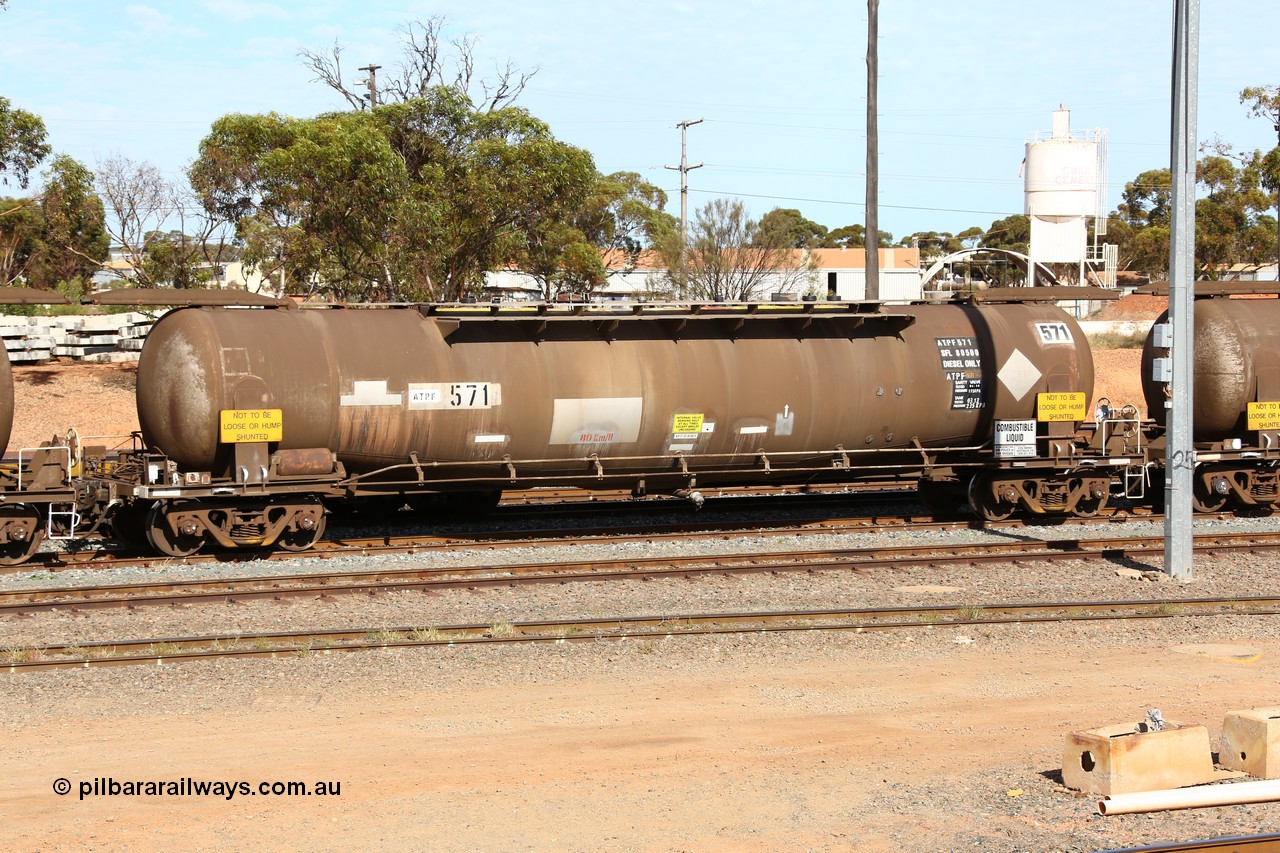 160523 3292
West Kalgoorlie, ATPF 571 fuel tank waggon is the type leader built by WAGR Midland Workshops in 1974 for Shell as WJP type 80.66 kL one compartment one dome, capacity of 80500 litres.
Keywords: ATPF-type;ATPF571;WAGR-Midland-WS;WJP-type;