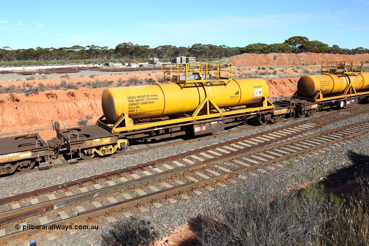 160523 3331
West Kalgoorlie, AQHY 30055 with CSA 0090, originally built by the WAGR Midland Workshops in 1964/66 as a WF type flat waggon, then in 1997, following several recodes and modifications, was one of seventy five waggons converted to the WQH to carry CSA sulphuric acid tanks between Hampton/Kalgoorlie and Perth. CSA 0090 was built by Vcare Engineering, India for Access Petrotec & Mining Solutions in 2015.
Keywords: AQHY-type;AQHY30055;WAGR-Midland-WS;WF-type;WFW-type;WFDY-type;WFDF-type;RFDF-type;WQH-type;