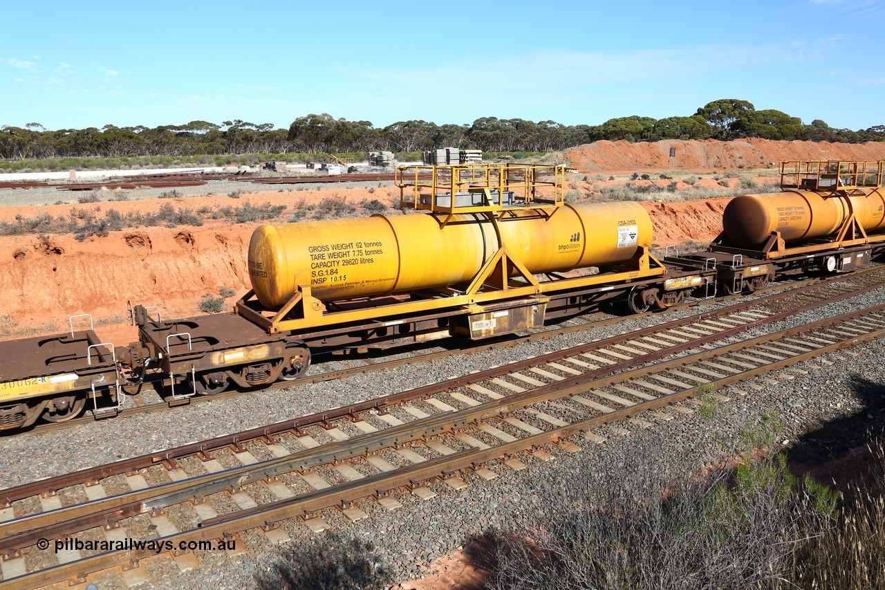 160523 3334
West Kalgoorlie, AQHY 30038 with CSA 0102, originally built by the WAGR Midland Workshops in 1964/66 as a WF type flat waggon, then in 1997, following several recodes and modifications, was one of seventy five waggons converted to the WQH to carry CSA sulphuric acid tanks between Hampton/Kalgoorlie and Perth. CSA 0102 was built by Vcare Engineering, India for Access Petrotec & Mining Solutions in 2015.
Keywords: AQHY-type;AQHY30038;WAGR-Midland-WS;WF-type;WFP-type;WFDY-type;WFDF-type;RFDF-type;WQH-type;