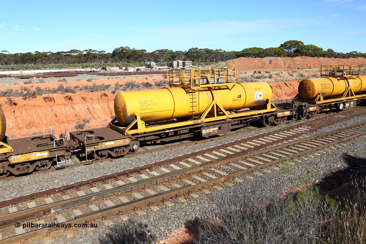 160523 3337
West Kalgoorlie, AQHY 30071 with CSA 0081, originally built by the WAGR Midland Workshops in 1964/66 as a WF type flat waggon, then in 1997, following several recodes and modifications, was one of seventy five waggons converted to the WQH to carry CSA sulphuric acid tanks between Hampton/Kalgoorlie and Perth. CSA 0081 is one of twelve units built by Acid Plant Management Services, WA in 2015.
Keywords: AQHY-type;AQHY30071;WAGR-Midland-WS;WF-type;WFDY-type;WFDF-type;RFDF-type;WQH-type;