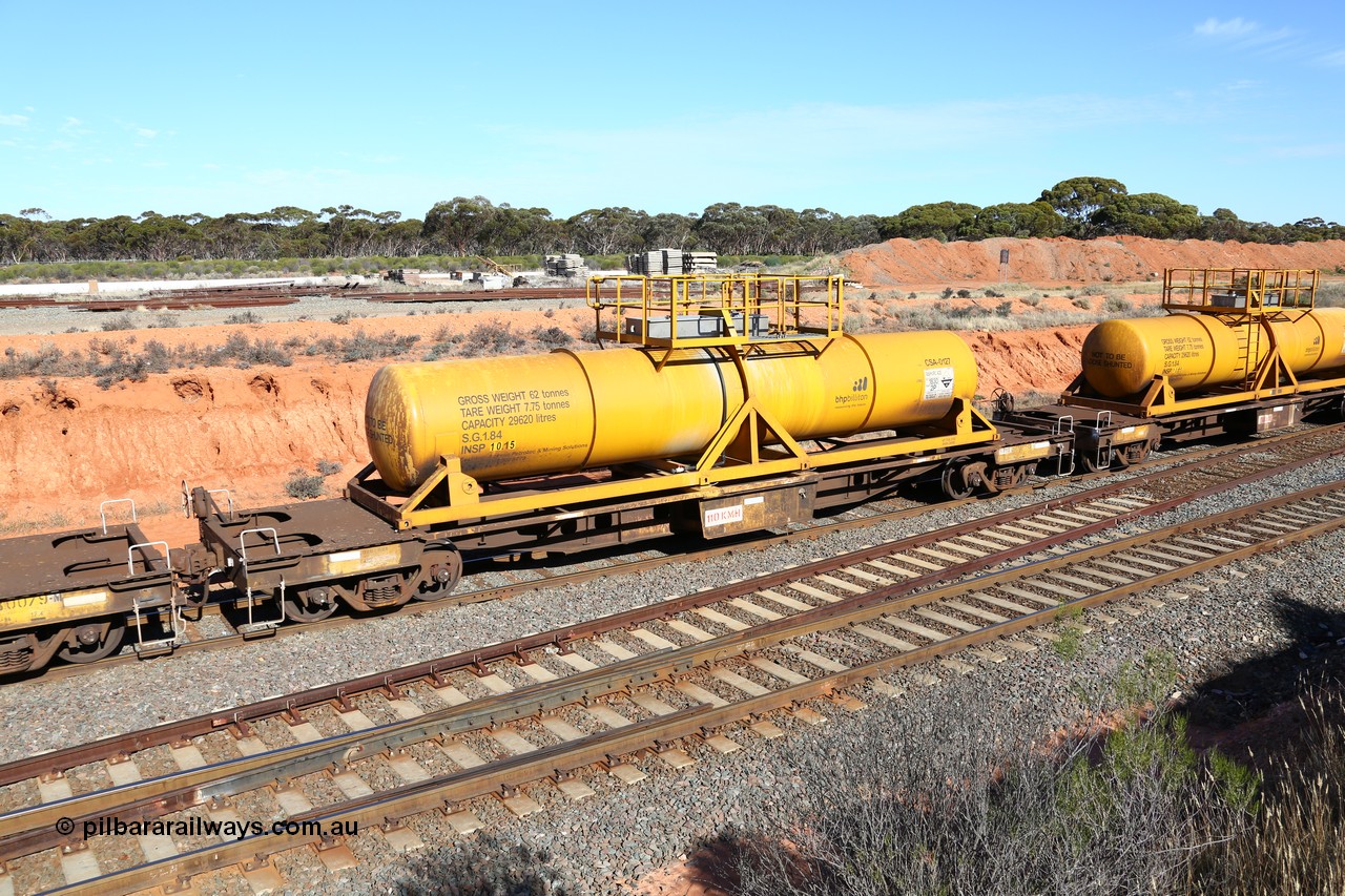 160523 3344
West Kalgoorlie, AQHY 30098 with CSA 0127, originally built by the WAGR Midland Workshops in 1964/66 as a WF type flat waggon, then in 1997, following several recodes and modifications, was one of seventy five waggons converted to the WQH to carry CSA sulphuric acid tanks between Hampton/Kalgoorlie and Perth. CSA 0127 was built by Vcare Engineering, India for Access Petrotec & Mining Solutions in 2015.
Keywords: AQHY-type;AQHY30098;WAGR-Midland-WS;WF-type;WMA-type;WFW-type;WFDY-type;WFDF-type;RFDF-type;WQH-type;