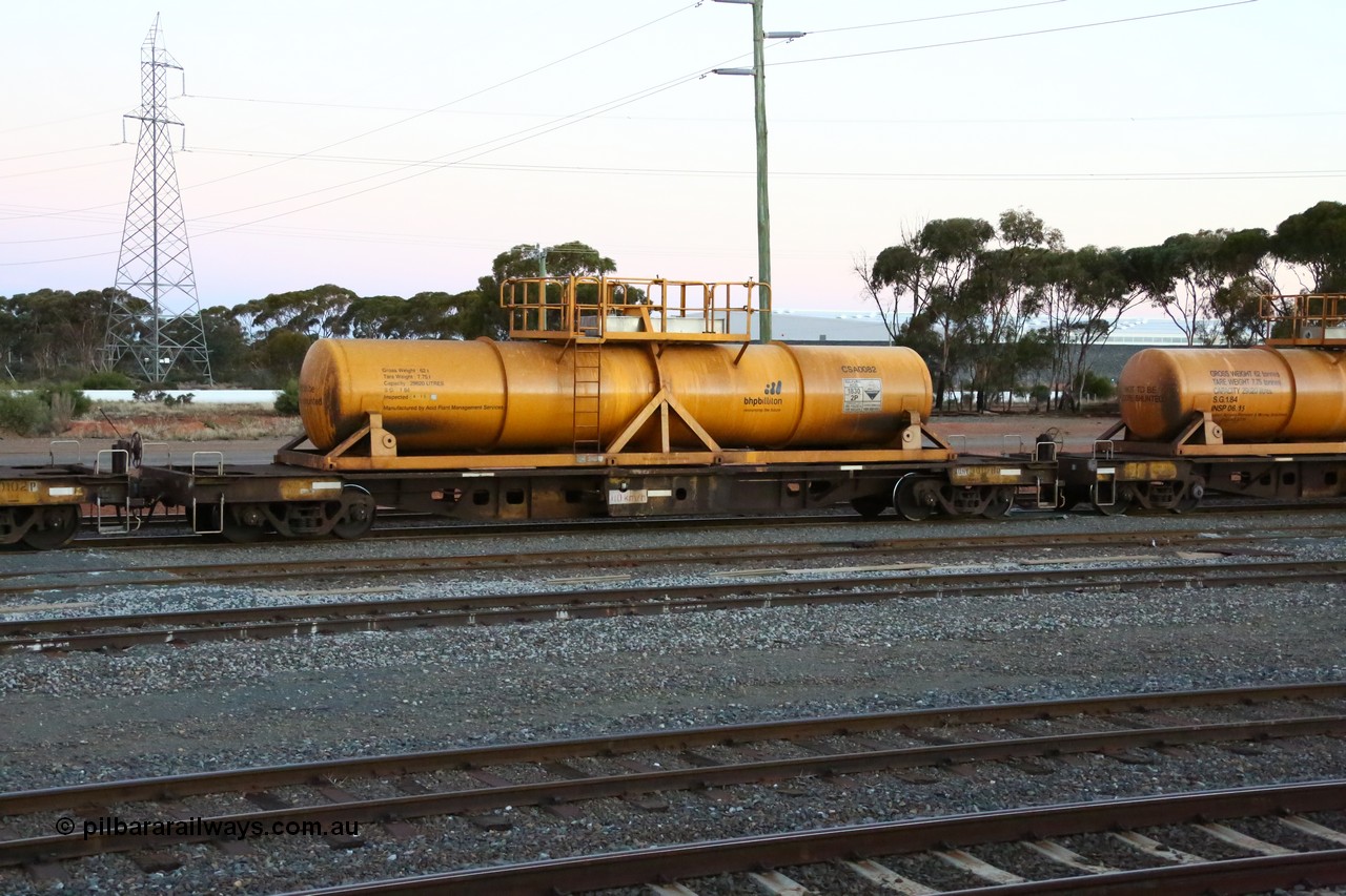 160523 3607
West Kalgoorlie, AQHY 30078 with sulphuric acid tank CSA 0082, originally built by WAGR Midland Workshops in 1964/66 as a WF type flat waggon, then in 1997, following several recodes and modifications, was one of seventy five waggons converted to the WQH type to carry CSA sulphuric acid tanks between Hampton/Kalgoorlie and Perth/Kwinana, part of loaded acid train 2406 arriving back in the yard. CSA 0082 is one of twelve units built by Acid Plant Management Services, WA in 2015.
Keywords: AQHY-type;AQHY30078;WAGR-Midland-WS;WF-type;WFDY-type;WFDF-type;RFDF-type;WQH-type;
