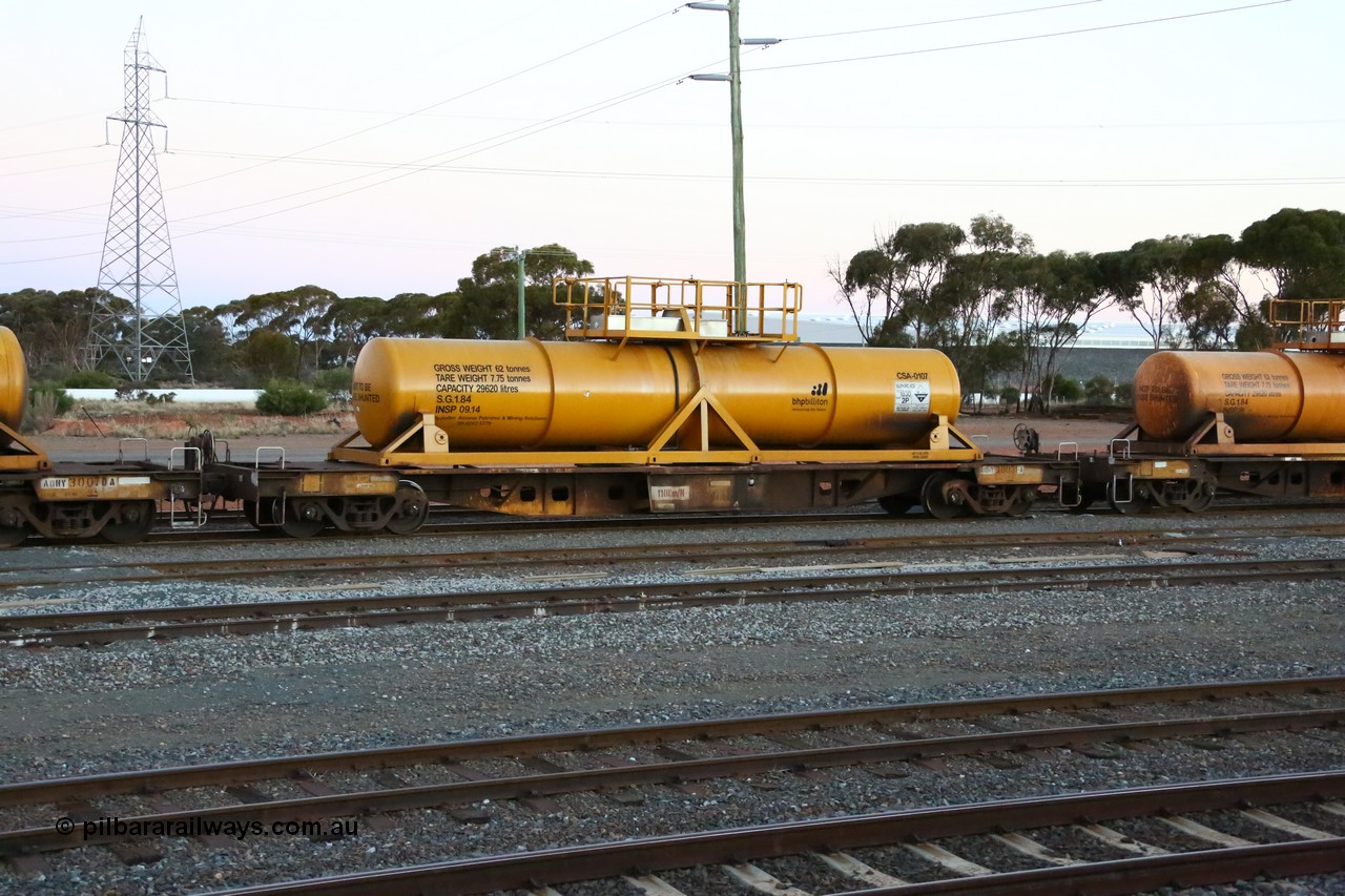 160523 3614
West Kalgoorlie, AQHY 30031 with sulphuric acid tank CSA 0107, originally built by WAGR Midland Workshops in 1964/66 as a WF type flat waggon, then in 1997, following several recodes and modifications, was one of seventy five waggons converted to the WQH type to carry CSA sulphuric acid tanks between Hampton/Kalgoorlie and Perth/Kwinana, part of loaded acid train 2406 arriving back in the yard. CSA 0107 was built by Vcare Engineering, India for Access Petrotec & Mining Solutions in 2015.
Keywords: AQHY-type;AQHY30031;WAGR-Midland-WS;WF-type;WFW-type;WFDY-type;WFDF-type;RFDF-type;WQH-type;