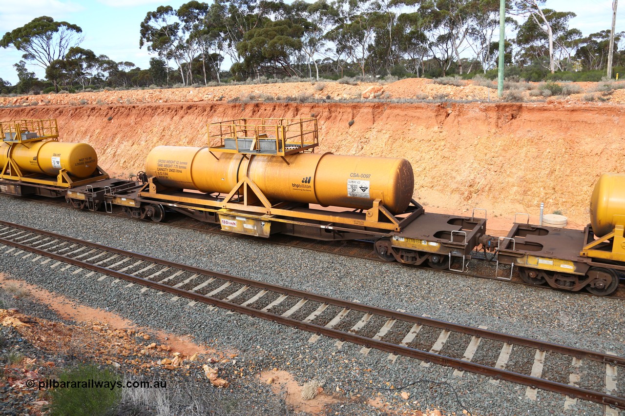 160525 4804
West Kalgoorlie, AQHY 30084 with sulphuric acid tank CSA 0097, originally built by WAGR Midland Workshops in 1964/66 as a WF type flat waggon, then in 1997, following several recodes and modifications, was one of seventy five waggons converted to the WQH type to carry CSA sulphuric acid tanks between Hampton/Kalgoorlie and Perth/Kwinana, part of empty acid train 4405 departing in the yard. CSA 0097 was built by Vcare Engineering, India for Access Petrotec & Mining Solutions in 2015.
Keywords: AQHY-type;AQHY30084;WAGR-Midland-WS;WF-type;WFDY-type;WFDF-type;RFDF-type;WQH-type;