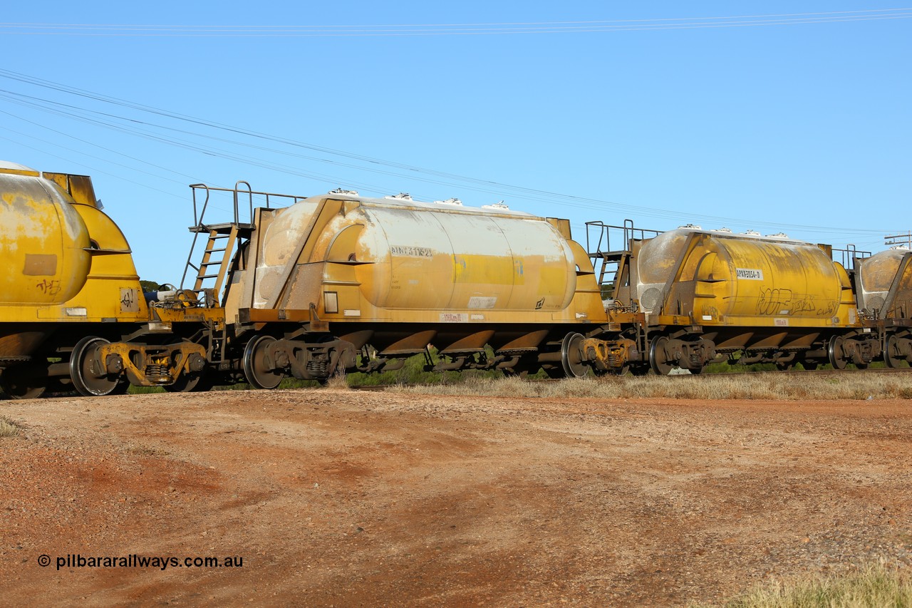 160527 5482
Parkeston, loaded lime and cement shunt train 2C71 from West Kalgoorlie to Parkeston for Cockburn Lime. APNY 31152, one of twelve built by WAGR Midland Workshops in 1974 as WNA type pneumatic discharge nickel concentrate waggon, WAGR built and owned copies of the AE Goodwin built WN waggons for WMC.
Keywords: APNY-type;APNY31152;WAGR-Midland-WS;WNA-type;