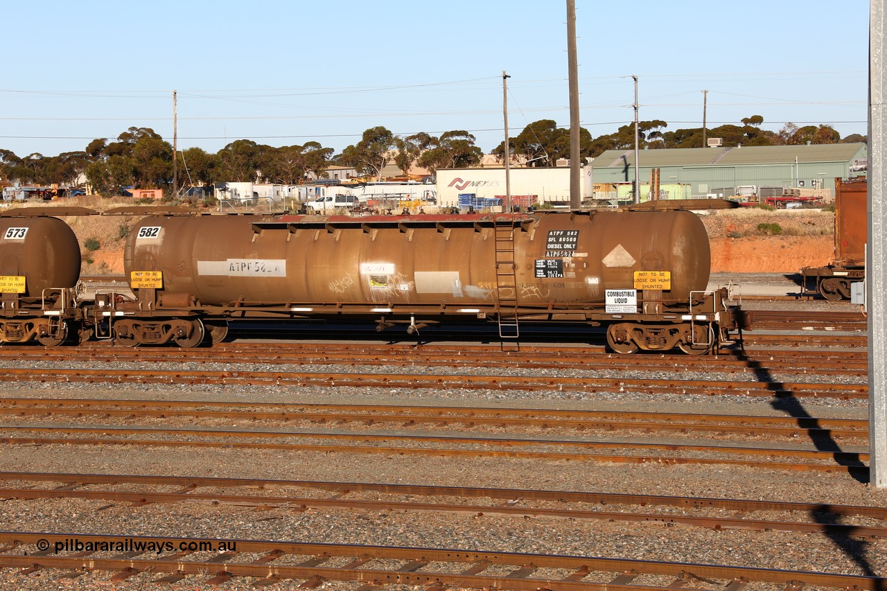 160601 10073
West Kalgoorlie, APTF type diesel fuel tanker ATPF 582, Shell Fleet No. 694, built by WAGR Midland Workshops in 1976 for Shell. Converted to narrow gauge 1986 and recoded JPC. Capacity now 80,500 litres.
Keywords: ATPF-type;ATPF582;WAGR-Midland-WS;WJP-type;JPC-type;