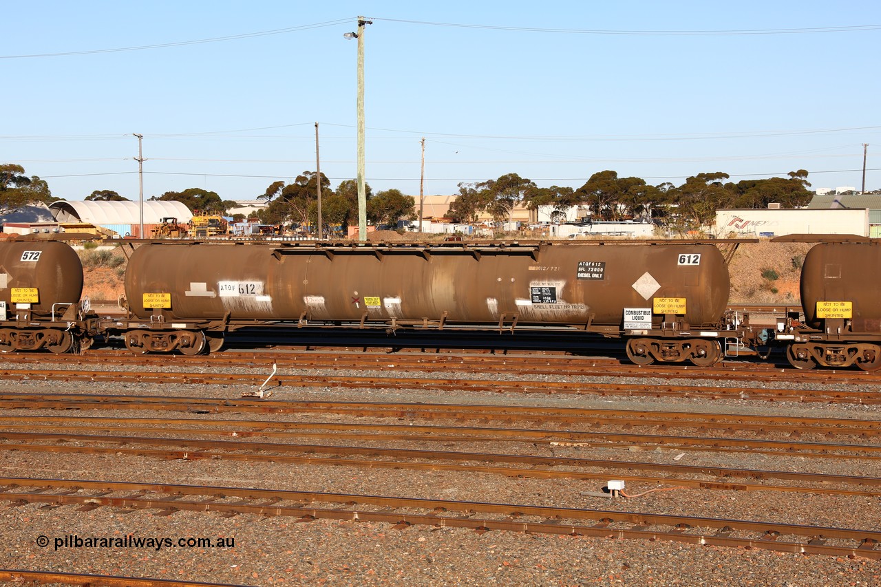 160601 10075
West Kalgoorlie, ATQF 612 diesel fuel tanker, Shell Fleet No. TR721, one of two such waggons built by Indeng Qld in 1982 for Shell as type WJQ with an original capacity of 79000 litres, current diesel capacity of 72000 litres, fitted with type F InterLock couplers.
Keywords: ATQF-type;ATQF612;Indeng-Qld;WJQ-type;