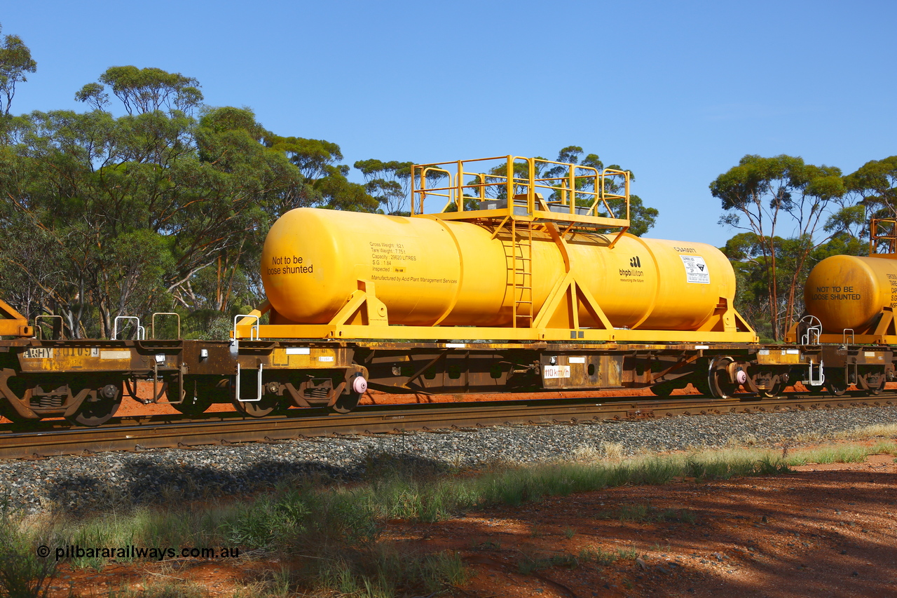 190108 1152
Binduli, AQHY 30013 with CSA 0077, originally built by the WAGR Midland Workshops in 1964/66 as a WF type flat waggon, then in 1997, following several recodes and modifications, was one of seventy five waggons converted to the WQH type to carry CSA sulphuric acid tanks between Hampton/Kalgoorlie and Perth/Kwinana. CSA 0077 was built by Acid Plant Management Services, WA.
Keywords: AQHY-type;AQHY30013;WAGR-Midland-WS;WF-type;WFW-type;WFDY-type;WFDF-type;RFDF-type;WQH-type;