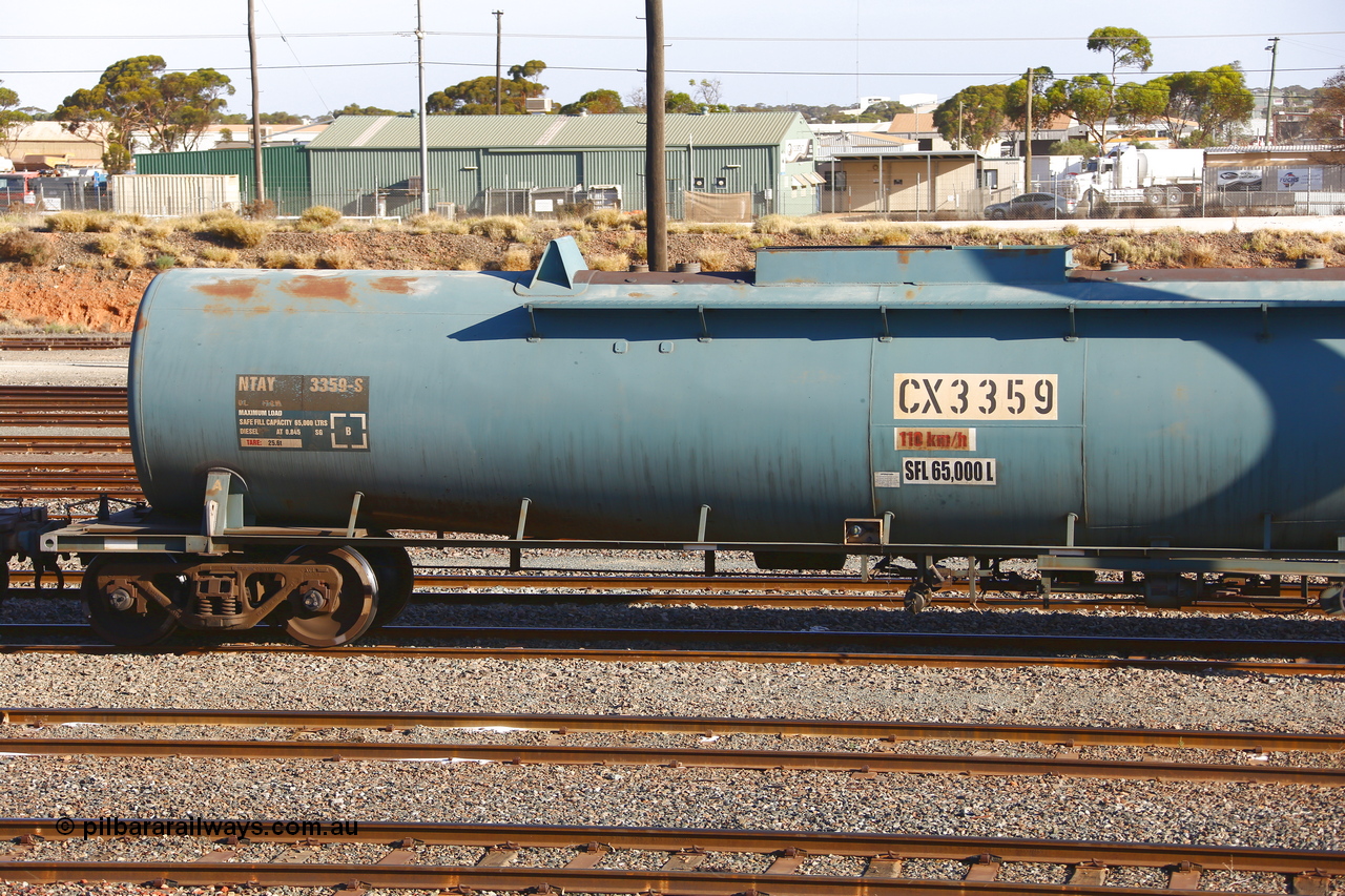 190108 1280
West Kalgoorlie, NTAY type fuel tank waggon NTAY 3359 with 65,000 litre capacity for Caltex. Refurbished by Gemco WA in Nov 2013 from a Caltex NTAF type tank waggon NTAF 359 originally built by Comeng NSW in 1975 as a CTX type CTX 359. Shows A end.
Keywords: NTAY-type;NTAY3359;Comeng-NSW;CTX-type;CTX359;NTAF-type;