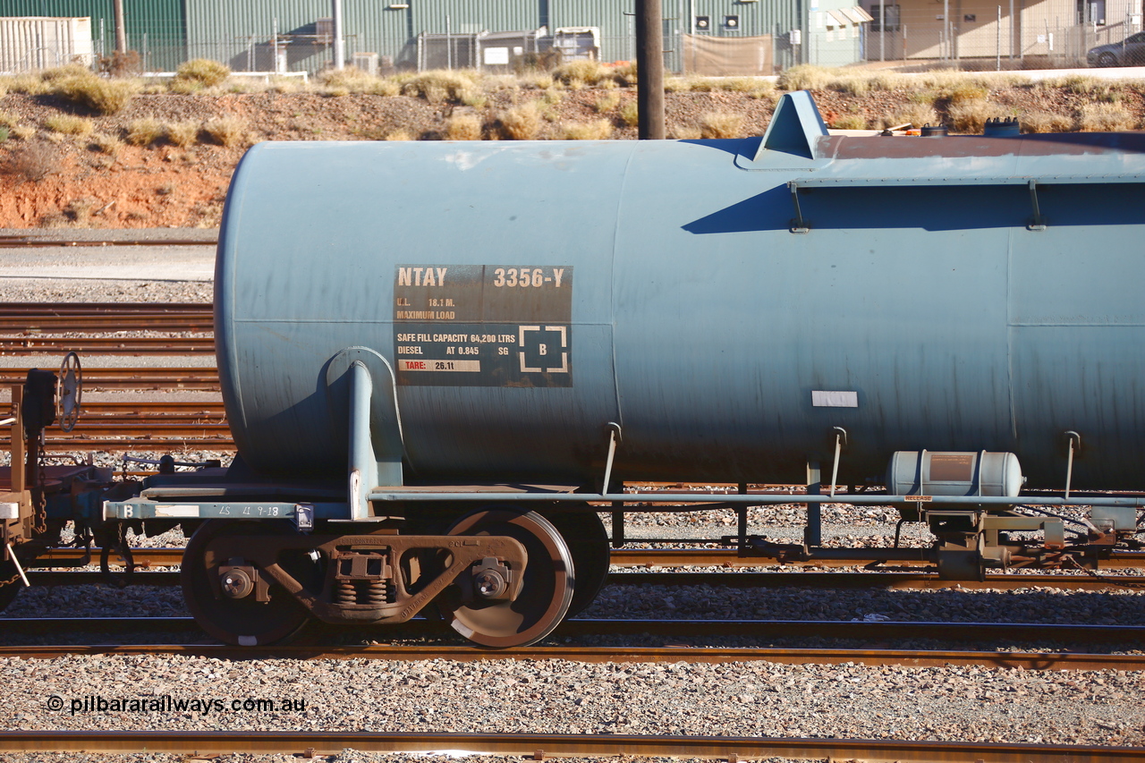 190108 1286
West Kalgoorlie, NTAY type fuel tank waggon NTAY 3356 with 64,200 litre capacity for Caltex. Refurbished by Gemco WA in Nov 2013 from a Caltex NTAF type tank waggon NTAF 356 originally built by Comeng NSW in 1974 as a CTX type CTX 356. Shows B end.
Keywords: NTAY-type;NTAY3356;Comeng-NSW;CTX-type;CTX356;NTAF-type;