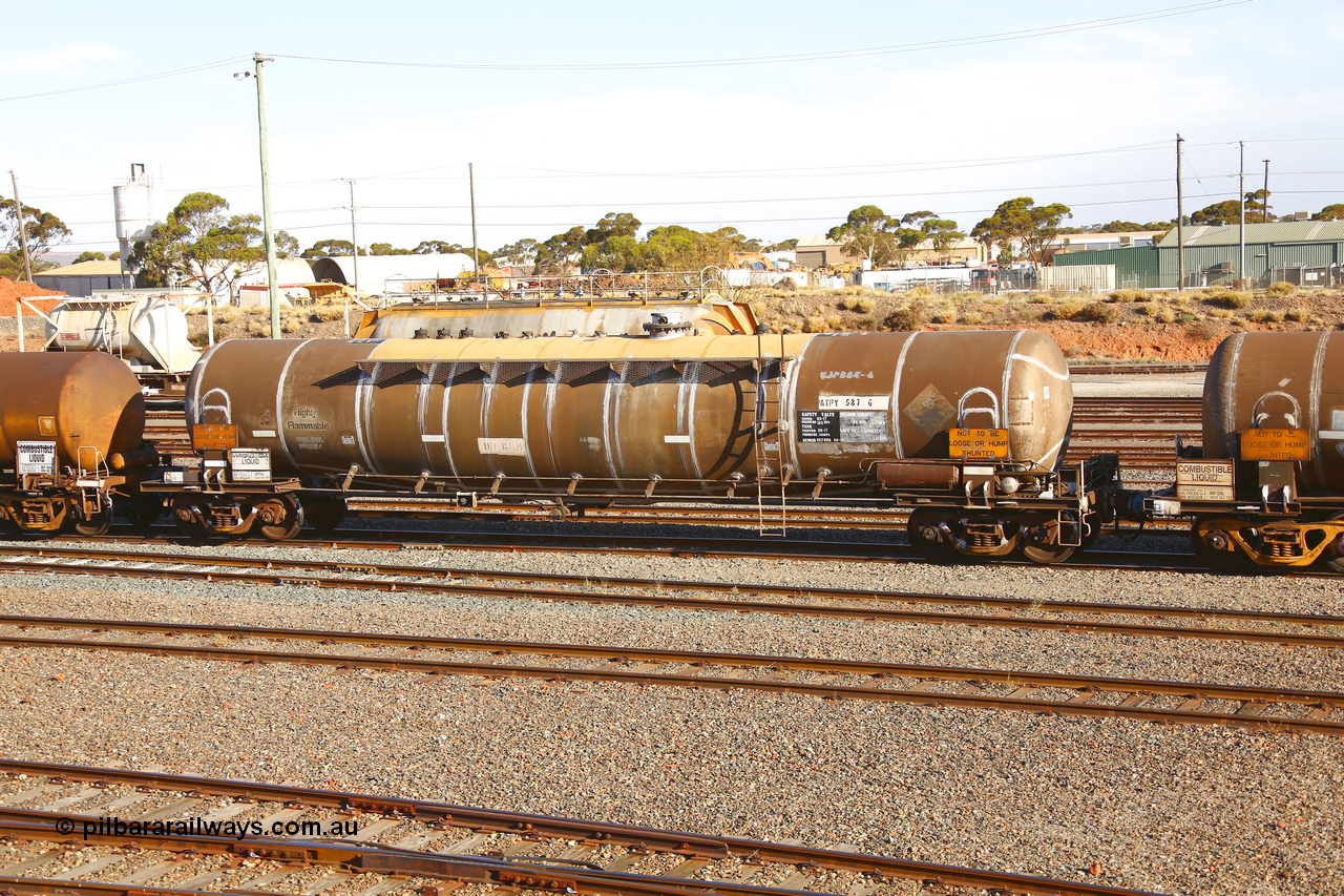 190108 1301
West Kalgoorlie, ATPY type fuel tank waggon ATPY 587 built by Westrail Midland Workshops in 1978 as WJP type 80.66 kL one compartment one dome, for Mobil, later sold to BP. Maximum capacity now of 84,000 litres. Gemco refurbished 06-17.
Keywords: ATPY-type;ATPY587;WAGR-Midland-WS;WJP-type;WJPY-type;