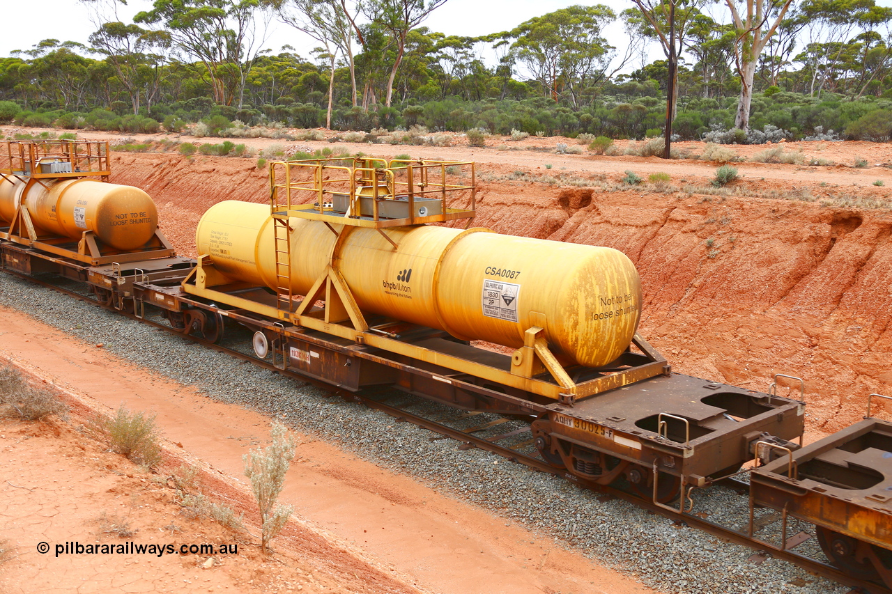 190109 1414
Binduli, AQHY 30025 with CSA 0087, originally built by the WAGR Midland Workshops in 1964/66 as a WF type flat waggon, then in 1997, following several recodes and modifications, was one of seventy five waggons converted to the WQH type to carry CSA sulphuric acid tanks between Hampton/Kalgoorlie and Perth/Kwinana. CSA 0087 was built by Acid Plant Management Services, WA.
Keywords: AQHY-type;AQHY30025;WAGR-Midland-WS;WF-type;WMA-type;WFDY-type;WFDF-type;RFDF-type;WQH-type;