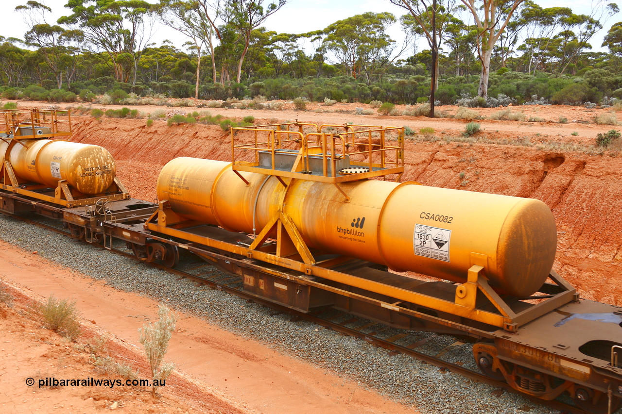 190109 1423
Binduli, AQHY 30078 with CSA 0082, originally built by the WAGR Midland Workshops in 1964/66 as a WF type flat waggon, then in 1997, following several recodes and modifications, was one of seventy five waggons converted to the WQH type to carry CSA sulphuric acid tanks between Hampton/Kalgoorlie and Perth/Kwinana. CSA 0082 was built by Acid Plant Management Services, WA.
Keywords: AQHY-type;AQHY30078;WAGR-Midland-WS;WF-type;WFDY-type;WFDF-type;RFDF-type;WQH-type;