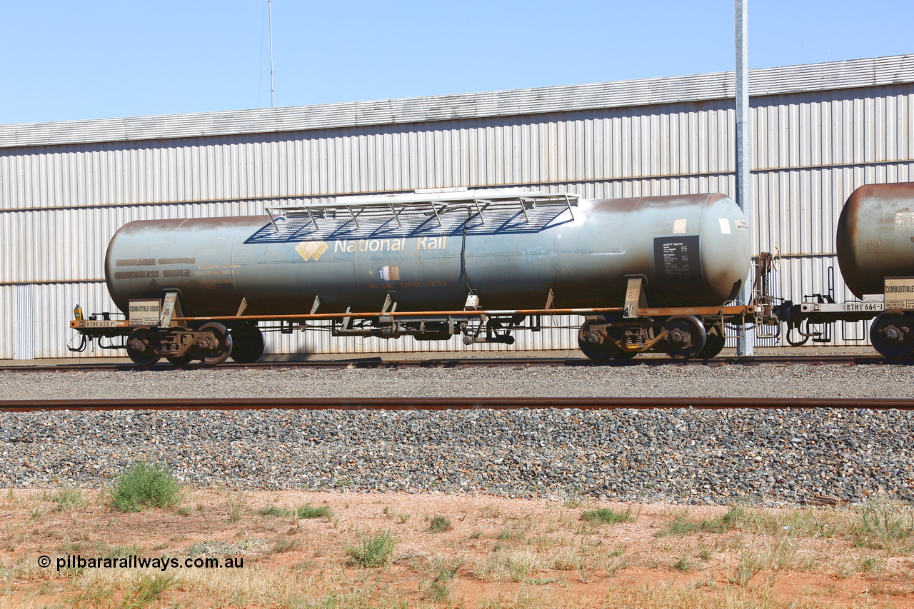 190109 1454
West Kalgoorlie, RHTY type tank waggon RHTY 653, one of fourteen such waggons built by Industrial Engineering Qld in 1976 for Victorian Railways as TWX type crude benzene tank 56,000 litres. Recoded to VTHX in 1979. After a period of storage ended up in National Rail ownership for Alice Springs traffic, now Pacific National ownership.
Keywords: RHTY-type;RHTY653;Indeng-Qld;TWX-type;VTHX-type;