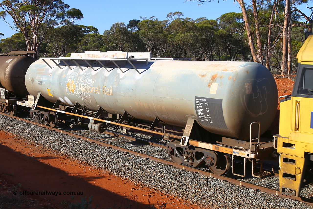 190109 1686
Binduli, empty fuel train 4445, RHTY type tank waggon RHTY 652, type leader of fourteen such waggons built by Industrial Engineering Qld in 1976 for Victorian Railways as TWX type crude benzene tank 56,000 litres. Recoded to VTHX in 1979. After a period of storage ended up in National Rail ownership for Alice Springs traffic, now Pacific National ownership.
Keywords: RHTY-type;RHTY652;Indeng-Qld;TWX-type;VTHX-type;