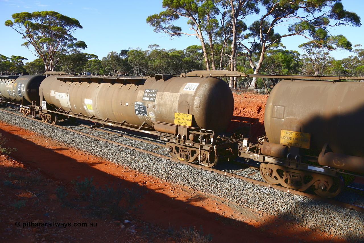 190109 1695
Binduli, empty fuel train 4445, ATPF type fuel tank waggon ATPF 581 built by WAGR Midland Workshops 1976 for Shell as type WJP 80.66 kL one compartment one dome. Current capacity is 80,500 litres, fitted with type F InterLock couplers. Under Viva Energy ownership.
Keywords: ATPF-type;ATPF581;WAGR-Midland-WS;WJP-type;JPC-type;
