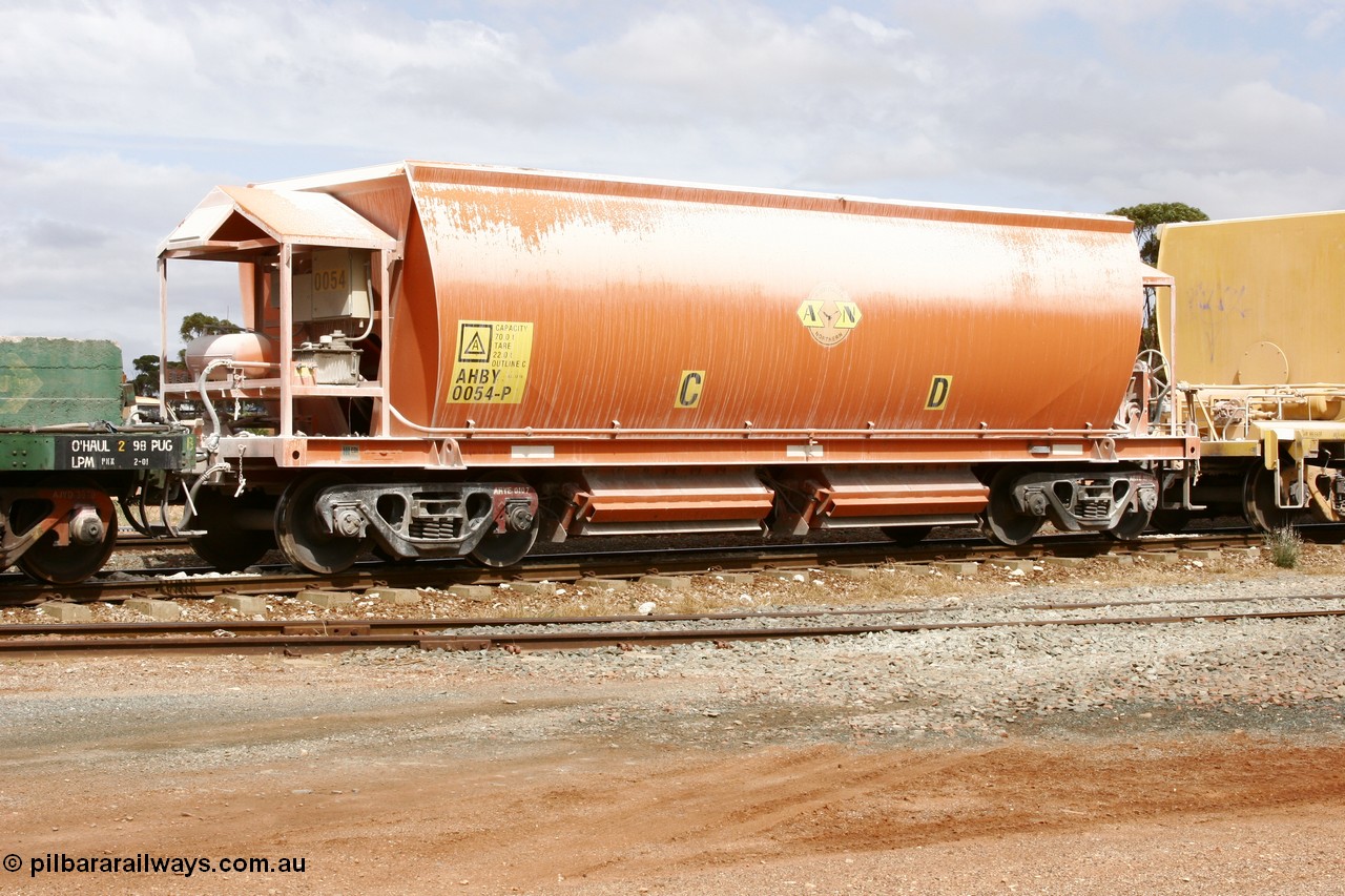 051101 6408
Parkeston, AHBY 0054 one of sixty five AHBY type ballast hoppers built by EDI Rail at their Port Augusta Workshops for ARG in 2001-02 for the Darwin line, also the FMG construction in 2008, seen here in limestone quarry product service.
Keywords: AHBY-type;AHBY0054;EDI-Rail-Port-Augusta-WS;