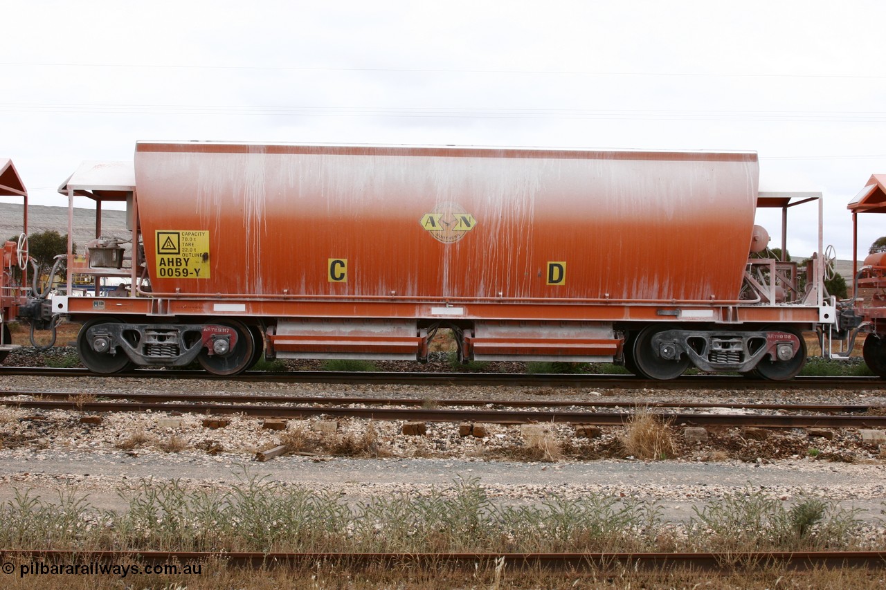 051101 6483
Parkeston, AHBY 0059 one of sixty five AHBY type ballast hoppers built by EDI Rail at their Port Augusta Workshops for ARG in 2001-02 for the Darwin line, also the FMG construction in 2008, here in limestone quarry products service.
Keywords: AHBY-type;AHBY0059;EDI-Rail-Port-Augusta-WS;