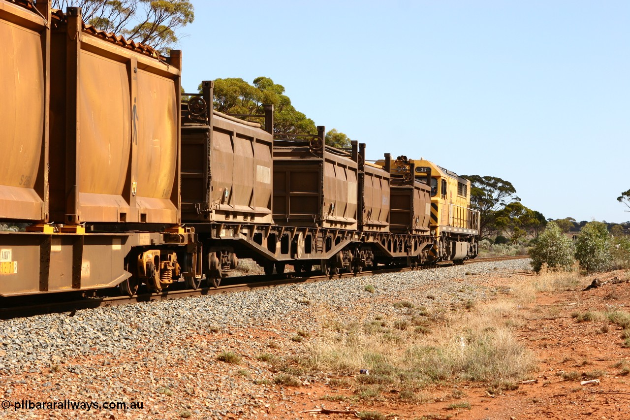 060117 2712
Bardoc, Q 317 leads the loaded Malcolm freighter train 2029, AQCY type container waggon with nickel residue container COR 5727. The AQCY type waggons were built by WAGR Midland Workshops as WFX class between 1969 and 1974.
Keywords: AQCY-type;WAGR-Midland-WS;WFX-type;WQCX-type;