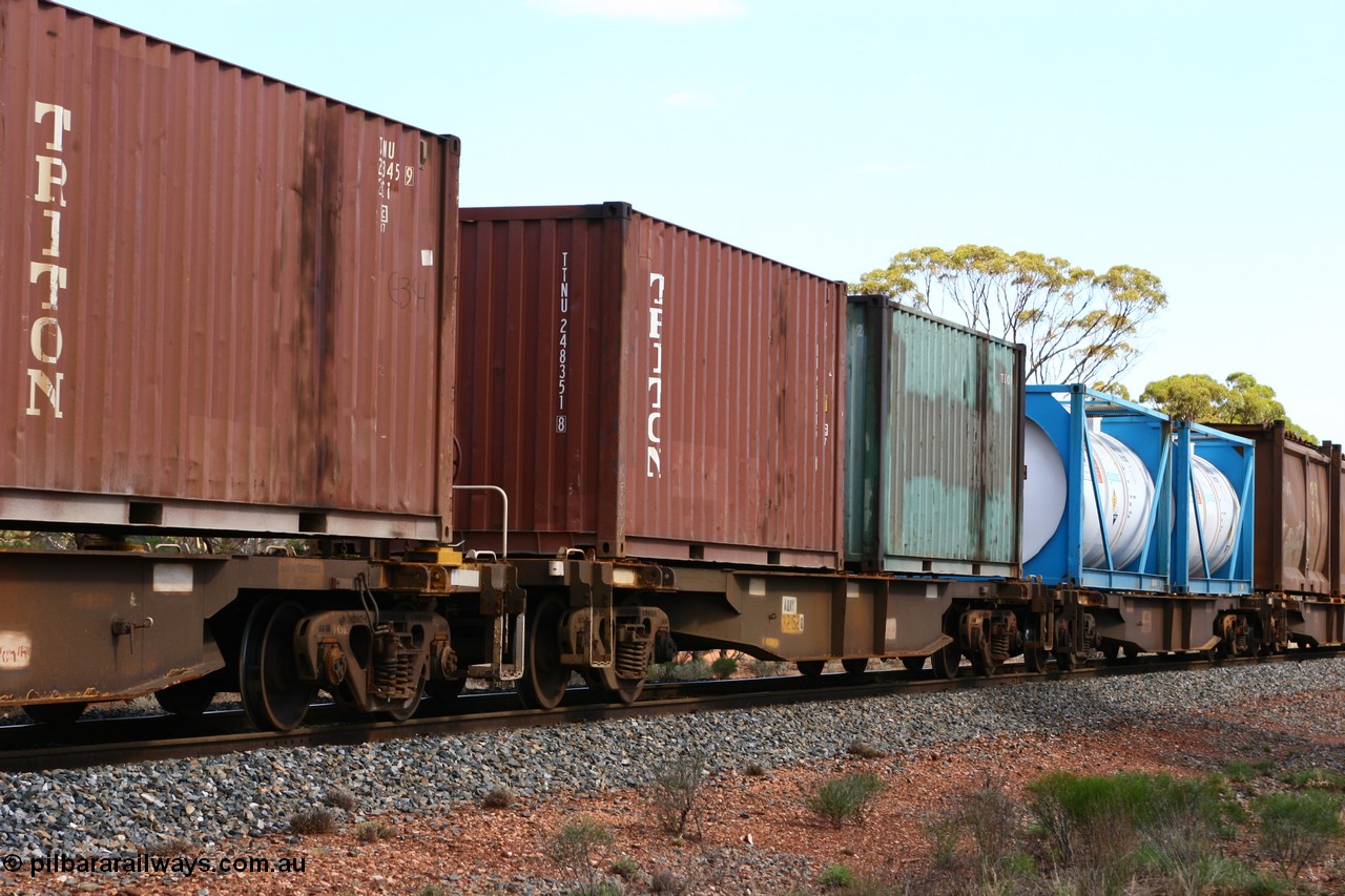 060117 2717
Bardoc, AQNY 32152, one of sixty two waggons built by Goninan WA in 1998 as WQN type for Murrin Murrin container traffic, with two 20' containers Triton TTNU 248351 and Royal Wolf RWTU 0093, train 2029 loaded Malcolm freighter.
Keywords: AQNY-type;AQNY32152;Goninan-WA;WQN-type;