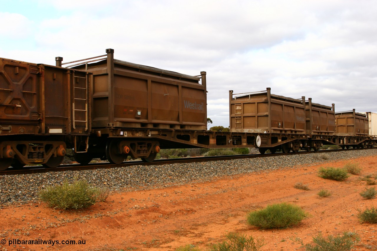 060527 4096
Scotia, AQCY 30348 container waggon, originally built by Tomlinson Steel WA as WFX type in 1970 from a batch of one hundred and sixty one waggons, to narrow gauge as QWF type in 1970, back to SG in 1972 as WFX, recoded in 1979 to WQCX type. With two COR type nickel residue containers with modified tops, COR 5818 and another.
Keywords: AQWY-type;AQWY30348;Tomlinson-Steel-WA;WFX-type;QWF-type;WQCX-type;