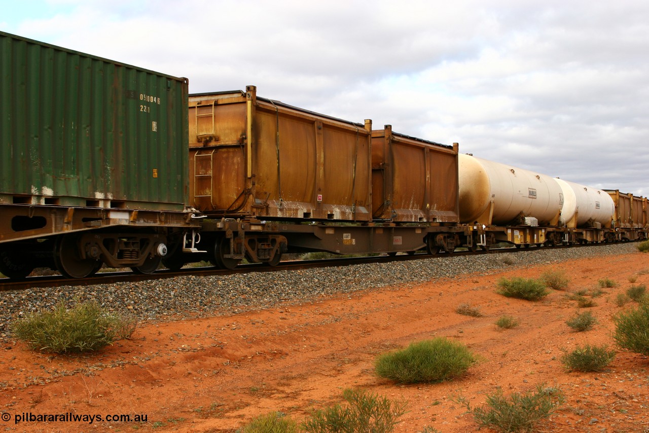 060527 4099
Scotia, AQNY 32172, one of sixty two waggons built by Goninan WA in 1998 as WQN type for Murrin Murrin container traffic, with sulphur skips S15D and S97Q both with original style doors, S15D has a modified top with tarpaulin lashed to sides, while S97Q has the original sliding tarpaulin, train 6029 loaded Malcolm freighter.
Keywords: AQNY-type;AQNY32172;Goninan-WA;WQN-type;