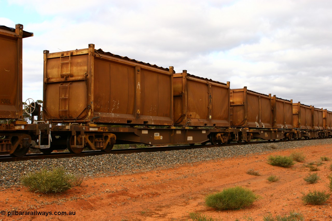 060527 4103
Scotia, AQNY 32212, final member of sixty two waggons built by Goninan WA in 1998 as WQN type for Murrin Murrin container traffic, with sulphur skips S44S and S40F both with original style doors and sliding tarpaulins, train 6029 loaded Malcolm freighter.
Keywords: AQNY-type;AQNY32212;Goninan-WA;WQN-type;