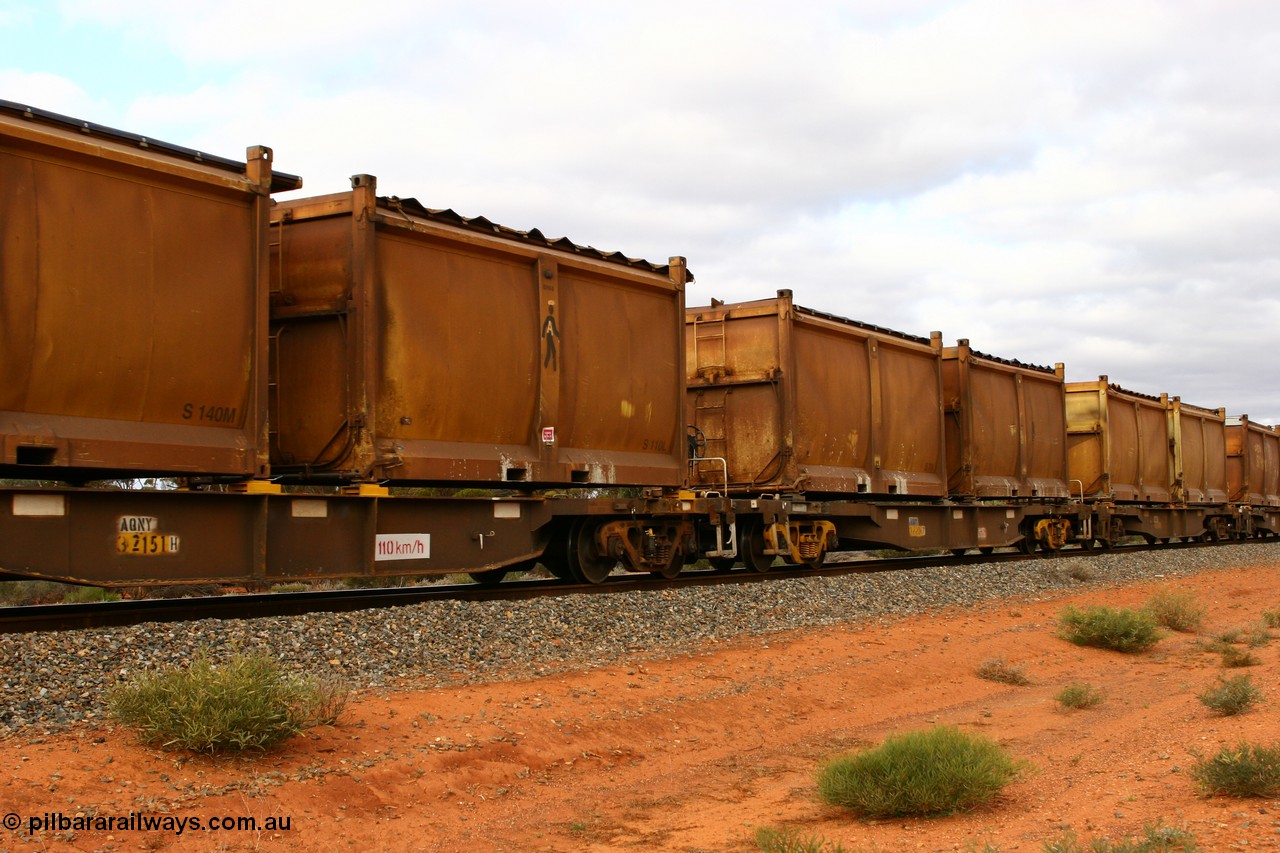 060527 4108
Scotia, AQNY 32151, type leader of sixty two waggons built by Goninan WA in 1998 as WQN type for Murrin Murrin container traffic, with sulphur skips S140M and S110L both with original style doors and sliding tarpaulins, S110L also has the 'Man' logo, train 6029 loaded Malcolm freighter.
Keywords: AQNY-type;AQNY32151;Goninan-WA;WQN-type;