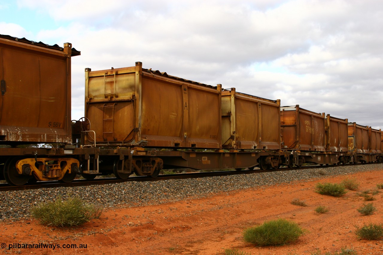 060527 4109
Scotia, AQNY 32169, one of sixty two waggons built by Goninan WA in 1998 as WQN type for Murrin Murrin container traffic, with sulphur skips S135D with original style door and sliding tarpaulin, and S124J with original door and modified roll top tarpaulin, train 6029 loaded Malcolm freighter.
Keywords: AQNY-type;AQNY32169;Goninan-WA;WQN-type;