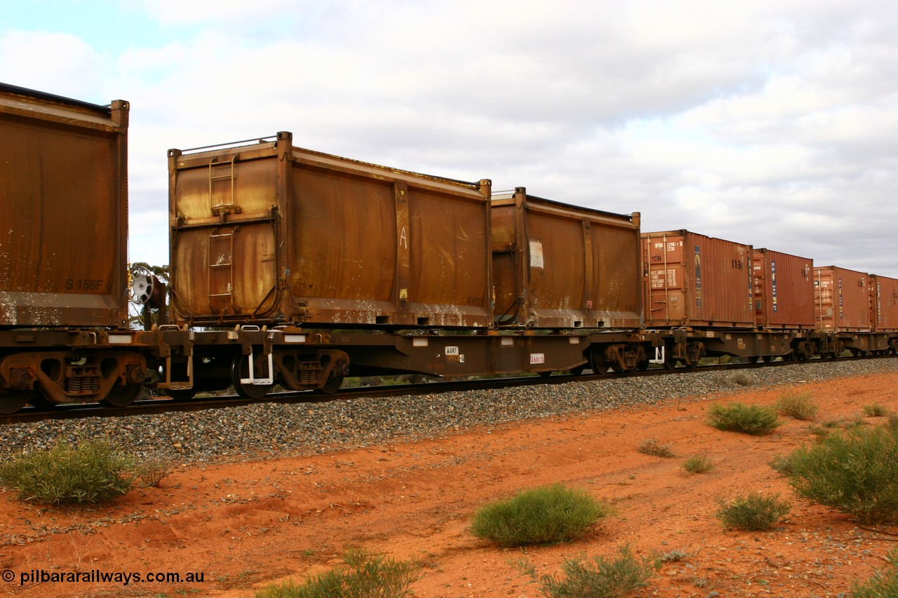 060527 4113
Scotia, AQNY 32191, one of sixty two waggons built by Goninan WA in 1998 as WQN type for Murrin Murrin container traffic, with sulphur skips S41Y and S84E with original doors and modified tops with tarpaulins, train 6029 loaded Malcolm freighter.
Keywords: AQNY-type;AQNY32191;Goninan-WA;WQN-type;