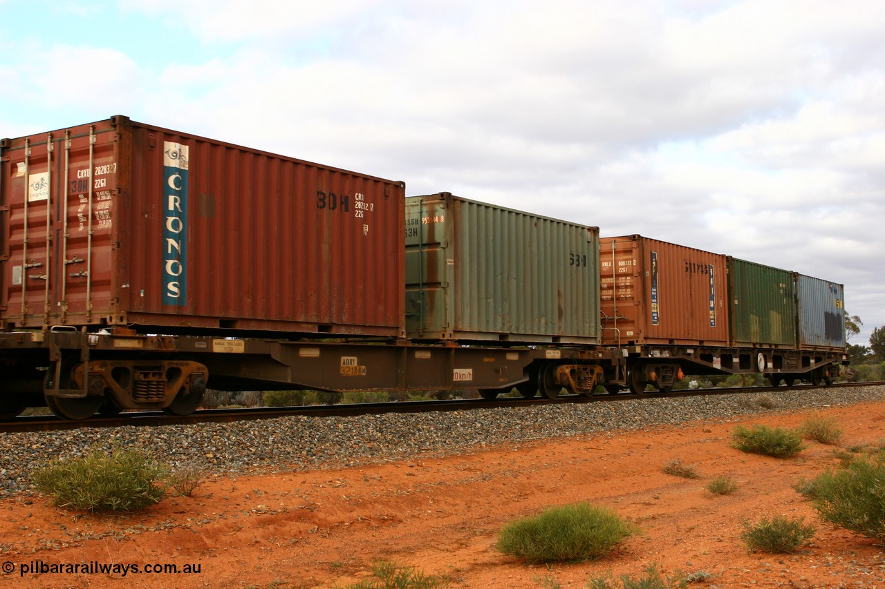 060527 4117
Scotia, AQNY 32184, one of sixty two waggons built by Goninan WA in 1998 as WQN type for Murrin Murrin container traffic, with two 20' containers, Cronos CRXU 262832 and unidentified RSSU 953644, train 6029 loaded Malcolm freighter.
Keywords: AQNY-type;AQNY32184;Goninan-WA;WQN-type;