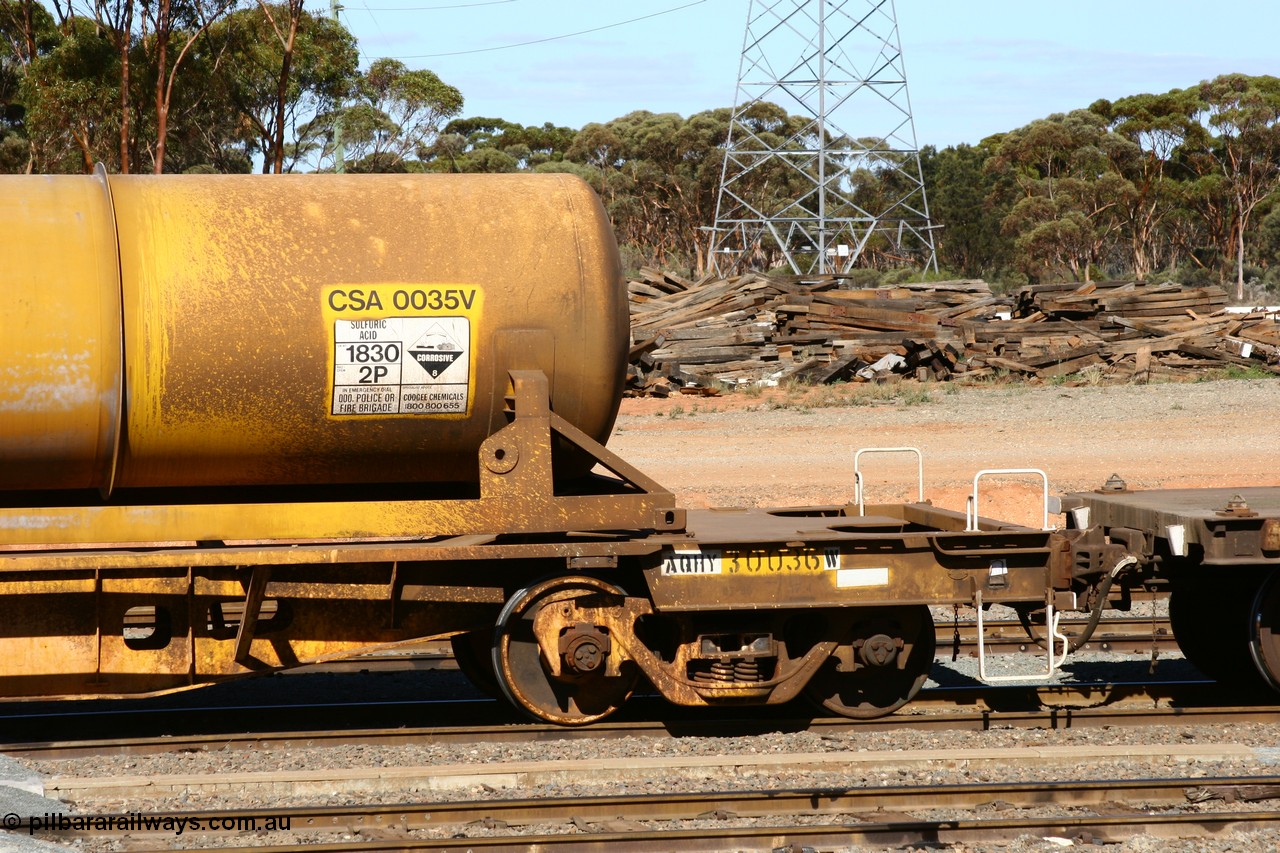 060528 4422
West Kalgoorlie, AQHY 30036 with sulphuric acid tank CSA 0035, originally built by the WAGR Midland Workshops in 1964/66 as a WF type flat waggon, then in 1997, following several recodes and modifications, was one of seventy five waggons converted to the WQH type to carry CSA sulphuric acid tanks between Hampton/Kalgoorlie and Perth/Kwinana.
Keywords: AQHY-type;AQHY30036;WAGR-Midland-WS;WF-type;WFP-type;WFDY-type;WFDF-type;RFDF-type;WQH-type;