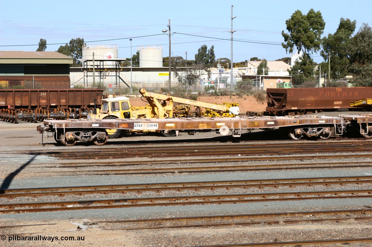 060528 4439
West Kalgoorlie, AFBF 33178 in kibble service, originally built by WAGR Midland Workshops in 1970 as WGX type open waggon, re-coded for gypsum traffic in 1980 at WGG type, then in 1987 converted to steel carrying traffic as WOSF type.
Keywords: AFBF-type;AFBF33178;WAGR-Midland-WS;WGX-type;WGG-type;WOSF-type;