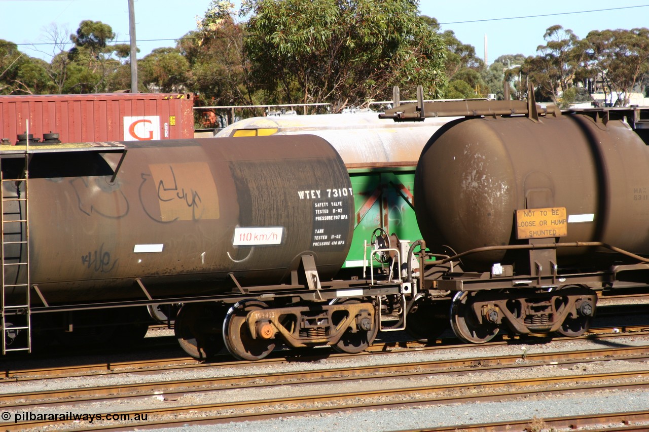 060528 4511
West Kalgoorlie, WTEY 7310 diesel fuel tank waggon, former NTAF in service for BP Oil, former AMPOL tank, coded WTEY when arrived in WA. End detail.
Keywords: WTEY-type;WTEY7310;NTAF-type;