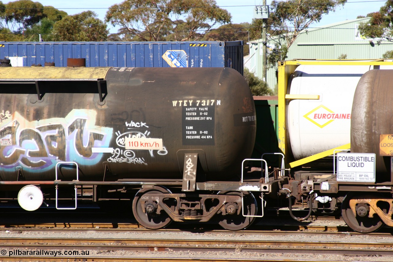060528 4513
West Kalgoorlie, WTEY 7317 diesel fuel tank waggon, former NTAF in service for BP Oil, former AMPOL tank, coded WTEY when arrived in WA. End detail.
Keywords: WTEY-type;WTEY7317;NTAF-type;