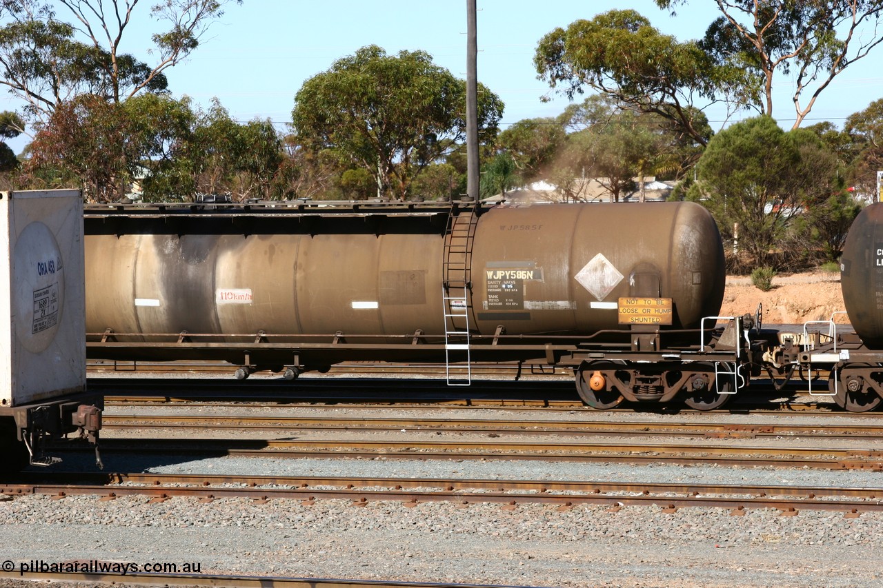 060528 4515 WJPY585N
West Kalgoorlie, WJPY 585 fuel tank waggon built by WAGR Midland Workshops in 1976 with 586 for Mobil and coded WJP type, sold to BP Oil in 1985, 80,000 litres one compartment one dome.
Keywords: WJPY-type;WJPY585;WAGR-Midland-WS;WJP-type;