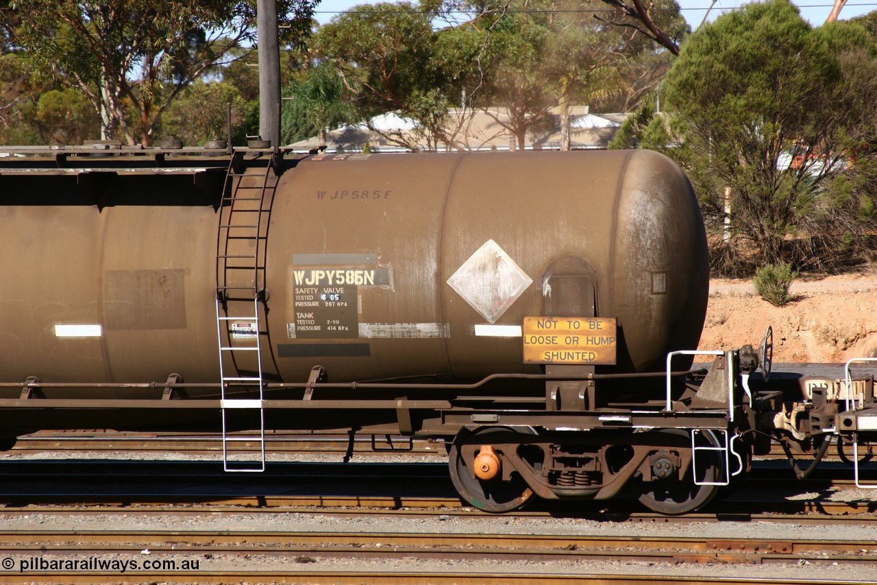 060528 4516
West Kalgoorlie, WJPY 585 fuel tank waggon built by WAGR Midland Workshops in 1976 with 586 for Mobil and coded WJP type, sold to BP Oil in 1985, 80,000 litres one compartment one dome.
Keywords: WJPY-type;WJPY585;WAGR-Midland-WS;WJP-type;