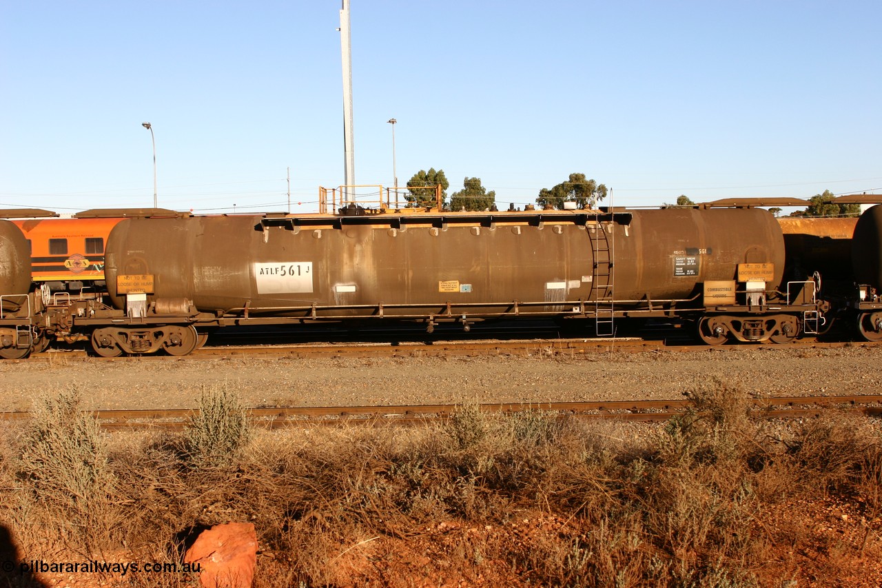 060528 4641 ATLF561J
West Kalgoorlie, ATLF 561 fuel tank waggon, built by WAGR Midland Workshops 1973 for Shell as type WJL 86,490 litres, one compartment one dome with a safe fill capacity of 80,500 litres.
Keywords: ATLF-type;ATLF561;WAGR-Midland-WS;WJL-type;