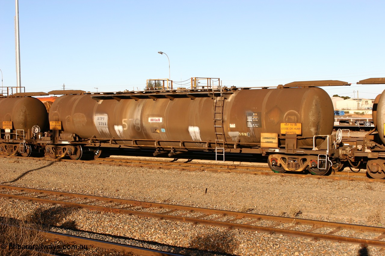 060528 4642 ATPF578A
West Kalgoorlie, ATPF 578 fuel tank waggon, originally built by WAGR Midland Workshops in 1974 for Shell as type WJP, it also spent time in SA in 1985, 80.66 kL one compartment one dome, capacity of 80350 litres, fitted with type F InterLock couplers.
Keywords: ATPF-type;ATPF578;WAGR-Midland-WS;WJP-type;