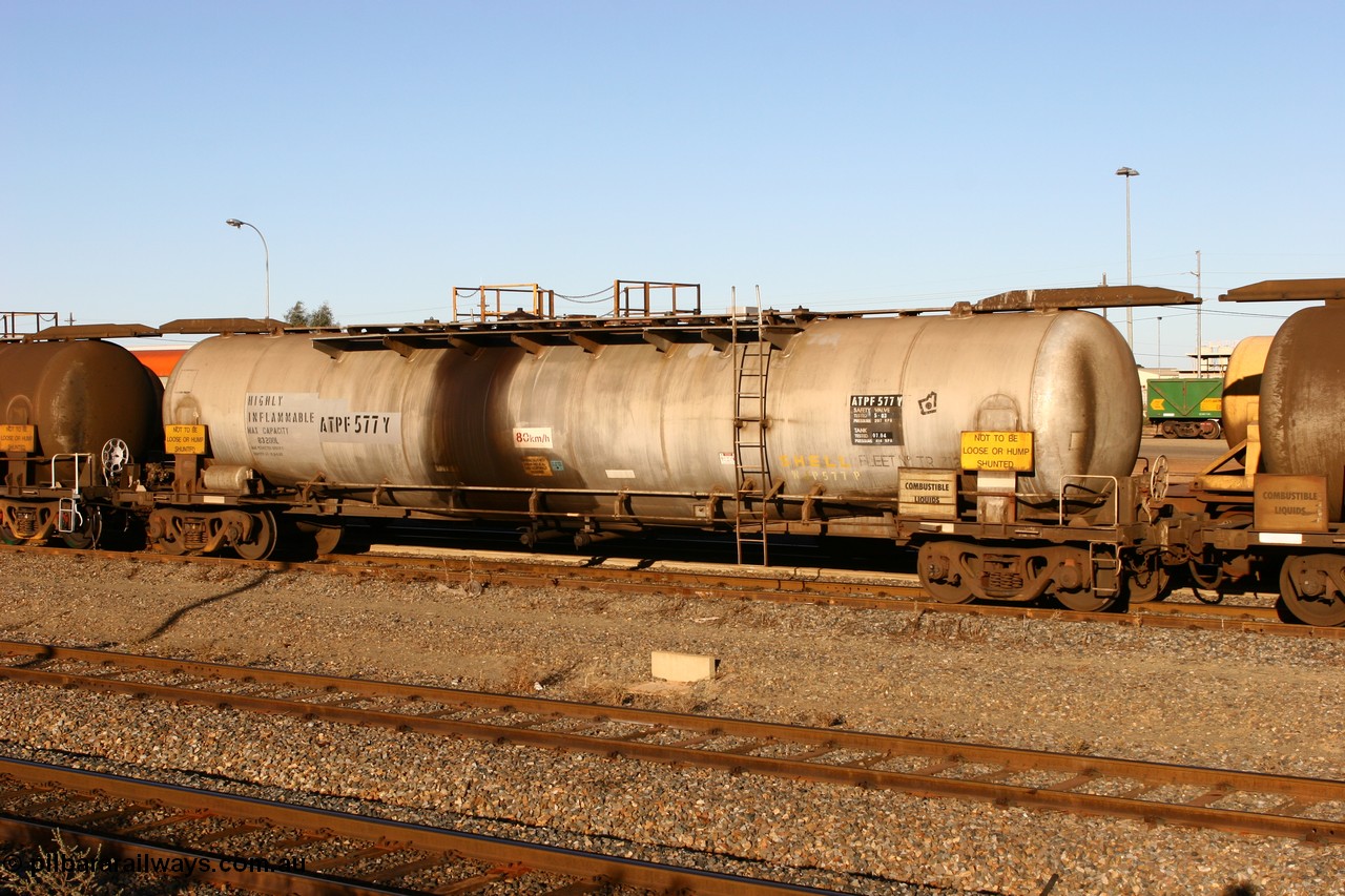 060528 4644 ATPF577Y
West Kalgoorlie, ATPF 577 fuel tank waggon built by WAGR Midland Workshops 1974 for Shell as type WJP, 80.66 kL one compartment one dome, capacity of 80500 litres, fitted with type F InterLock couplers Shell Fleet no. TR712.
Keywords: ATPF-type;ATPF577;WAGR-Midland-WS;WJP-type;