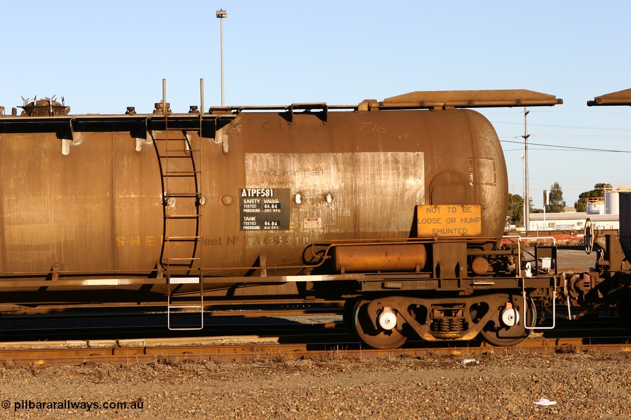 060528 4648
West Kalgoorlie, ATPF 581 fuel tank waggon built by WAGR Midland Workshops 1976 for Shell as type WJP 80.66 kL one compartment one dome, fitted with type F InterLock coupler. Converted to narrow gauge 1986 and recoded JPC.
Keywords: ATPF-type;ATPF581;WAGR-Midland-WS;WJP-type;JPC-type;