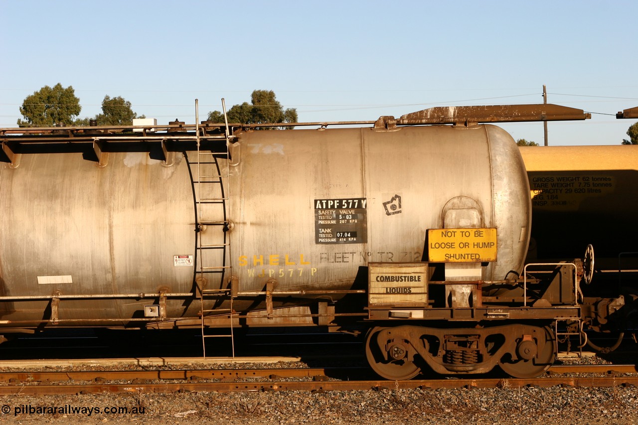 060528 4657
West Kalgoorlie, ATPF 577 fuel tank waggon built by WAGR Midland Workshops 1974 for Shell as type WJP, 80.66 kL one compartment one dome, capacity of 80500 litres, fitted with type F InterLock couplers Shell Fleet no. TR712.
Keywords: ATPF-type;ATPF577;WAGR-Midland-WS;WJP-type;