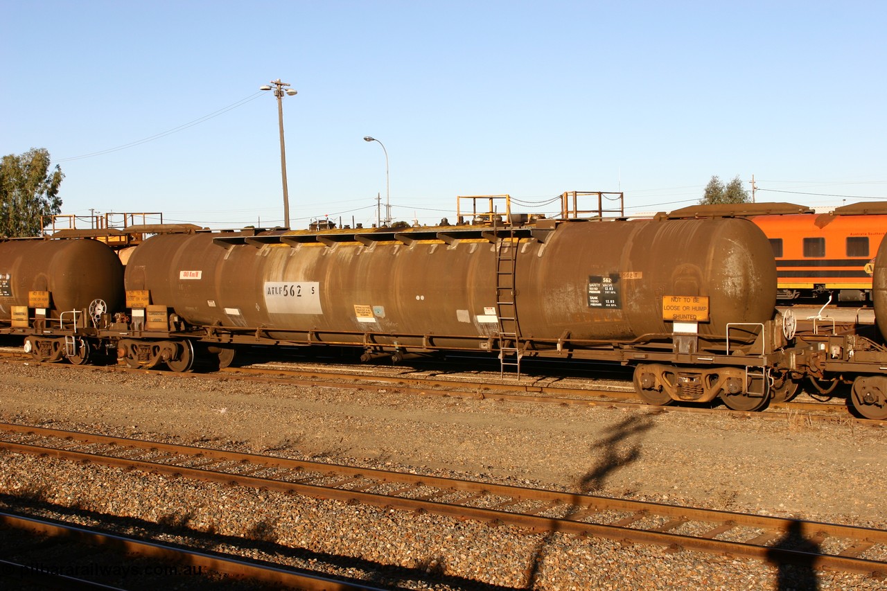 060528 4660
West Kalgoorlie, ATLF 562 tank waggon, built by WAGR Midland Workshops 1973 for Shell as type WJL 86.49 kL one compartment one dome with a capacity of 80500 litres, fitted with type F InterLock couplers.
Keywords: ATLF-type;ATLF562;WAGR-Midland-WS;WJL-type;