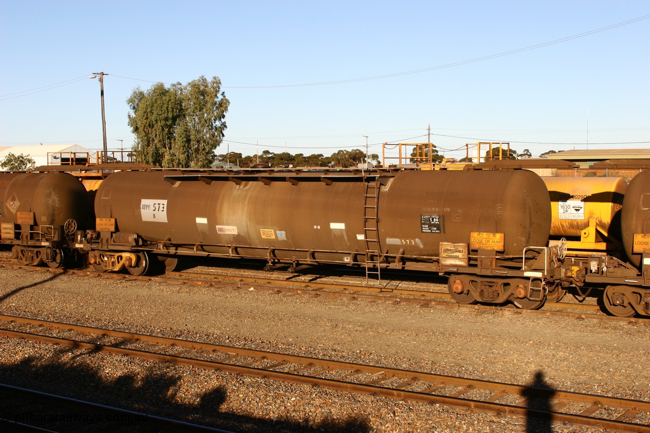 060528 4662
West Kalgoorlie, ATPF 573 fuel tank waggon built by WAGR Midland Workshops 1974 for Shell as WJP type 80.66 kL one compartment one dome, capacity of 80500 litres, Shell Fleet No. 708.
Keywords: ATPF-type;ATPF573;WAGR-Midland-WS;WJP-type;